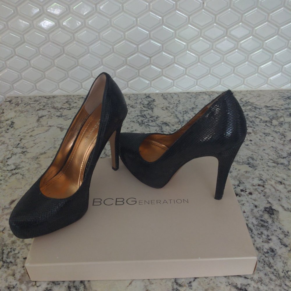 Black snakeskin BCBG pumps